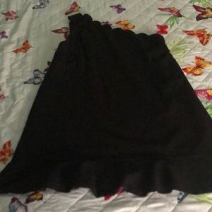 One shoulder black dress.